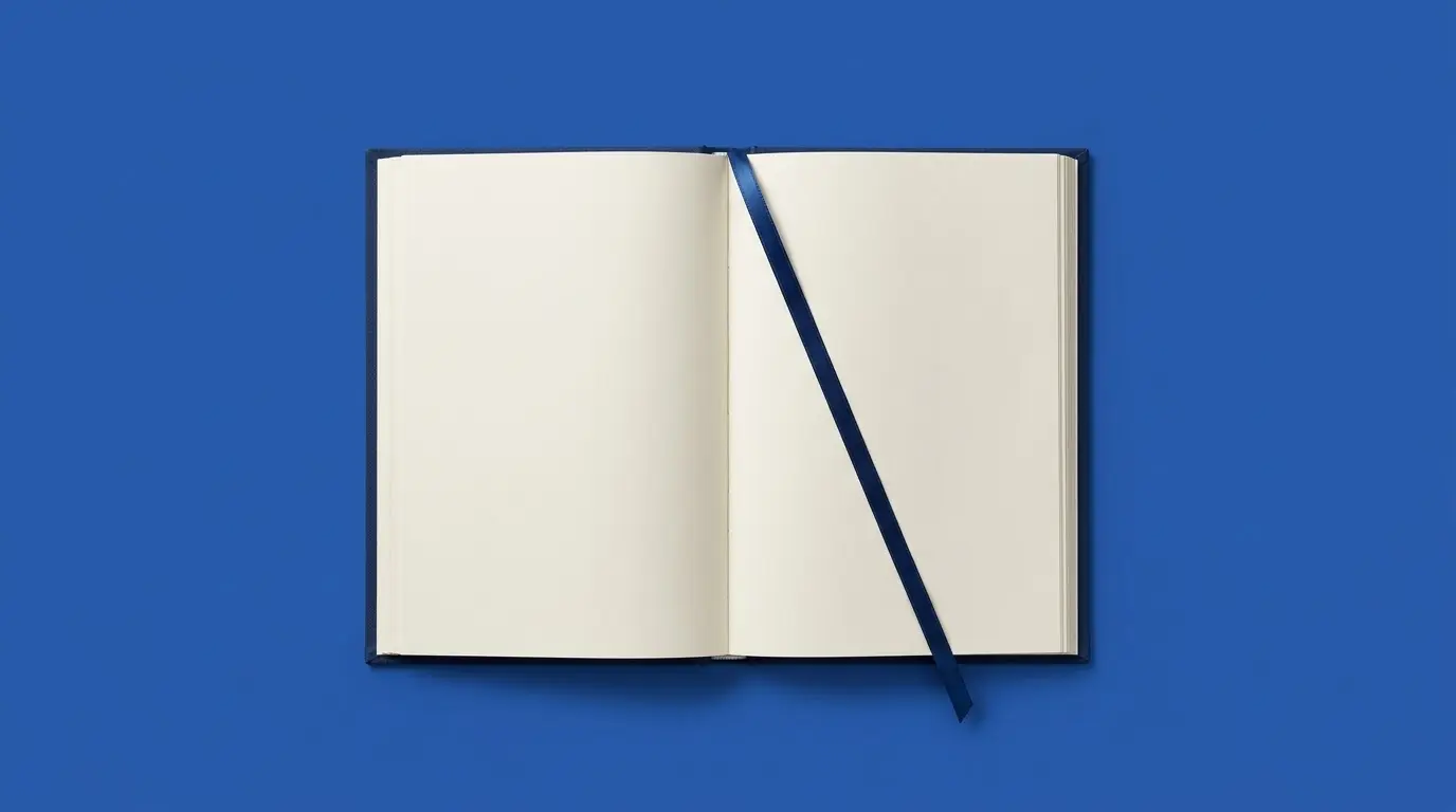 An open book with a ribbon bookmark, on a cobalt blue background